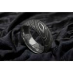 Men’s Damascus Steel Band Ring – Balanced Weight with Classic Forged Style, Handmade Personalized Anniversary Gift SetDiscover the timeless appeal of handcrafted metalwork with this artisan men’s Damascus steel band ring from Alfa Cutlery. Designed with a balanced weight and classic forged style, this ring combines a refined appearance with the distinctive character of handmade Damascus steel.  The ring features a personalization option, making it a thoughtful choice for anniversaries, weddings, and other memorable occasions. Customers can also submit their own logo for customization, subject to review of the requested design and feasibility.  Presented as a ring gift set, this handcrafted Damascus steel band makes a distinctive and meaningful gift for men who appreciate classic forged craftsmanship.  3. Product Details Product Type: Ring Gift Set Material: Damascus Steel Style: Anniversary Gift Feature: Personalization Technique: Handmade Application: Damascus Ring Printing: Not Applicable Design: Classic Forged Style Weight: Balanced Weight Type: Damascus Steel Band Ring Customization: Personalization Option Logo: Accept Customer's Logo Shipping: DHL